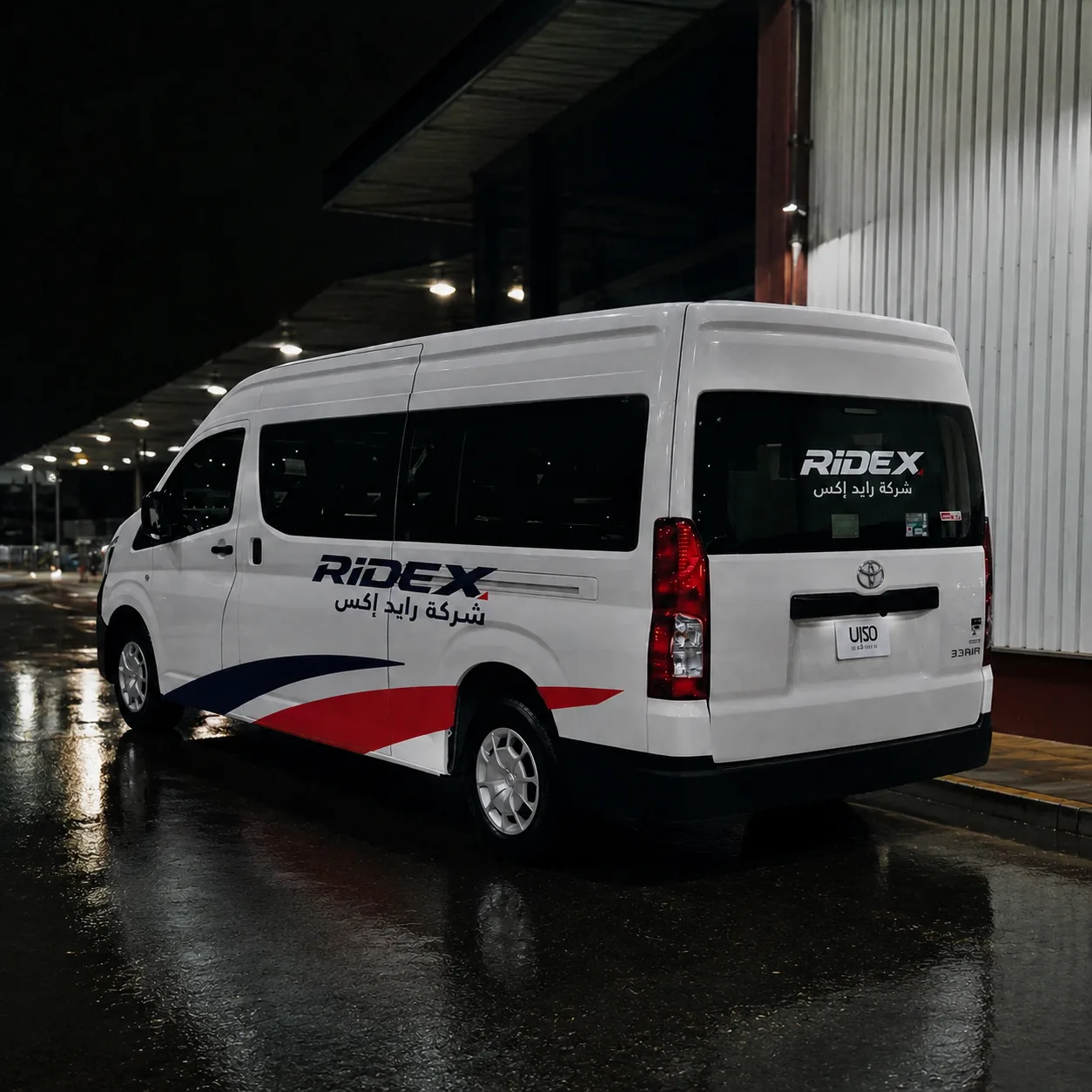 White Ride X Toyota HiAce van at a loading dock at night